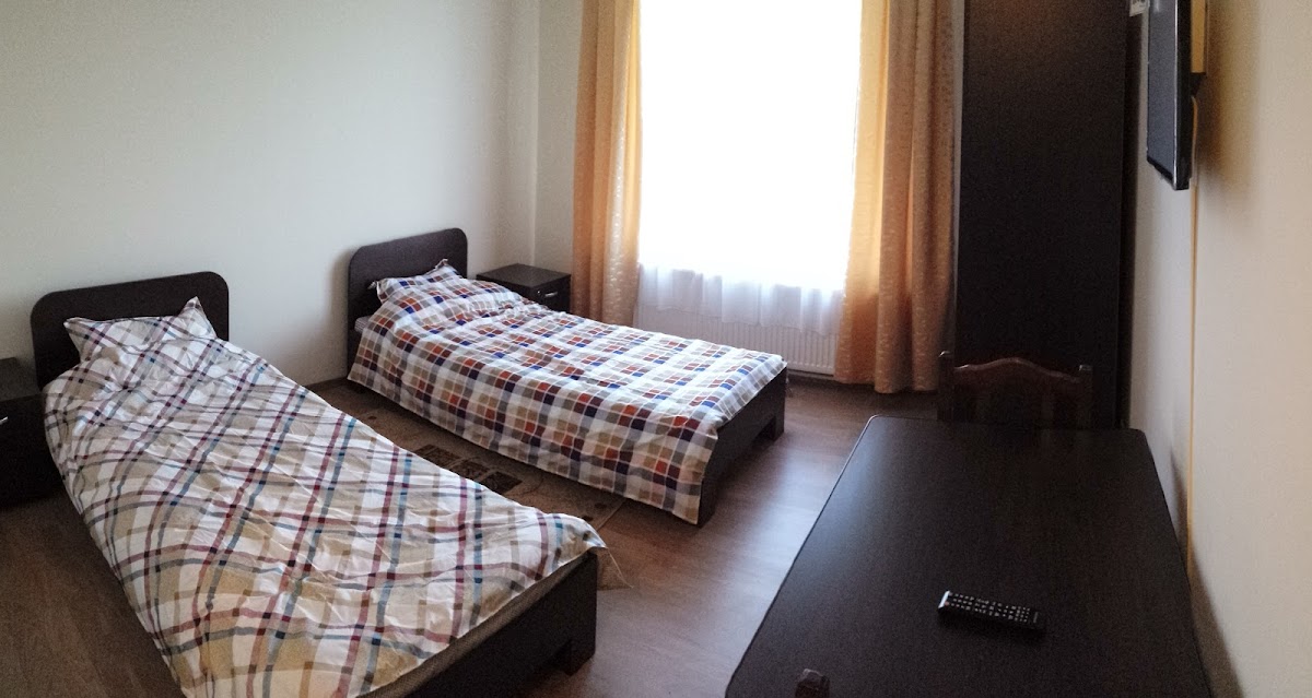 Pensiunea Carpatia - foto 2